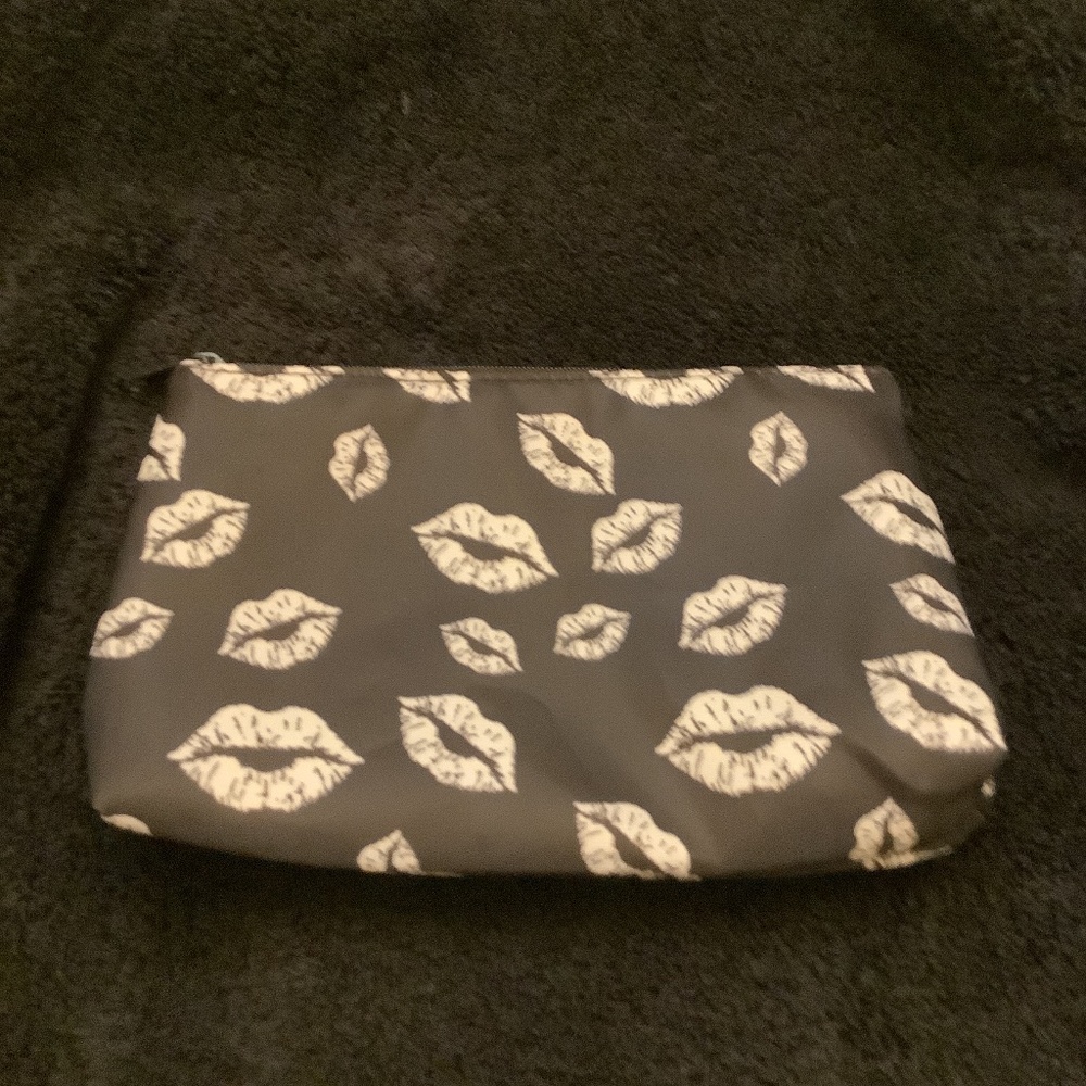 Cute vinyl makeup bag with zipper and waterproof lining. NEW.